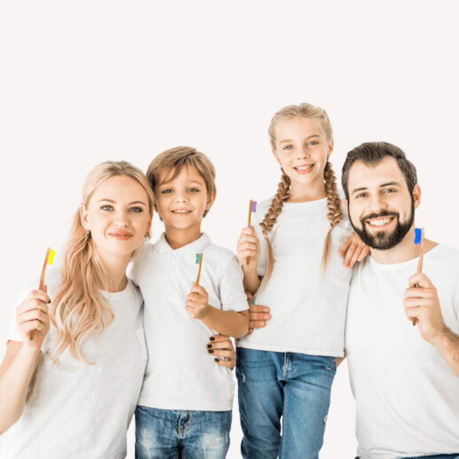 Family of two parents and two kids using Bamkiki toothbrush as an eco friendly biodegradable sustainable bamboo toothbrush