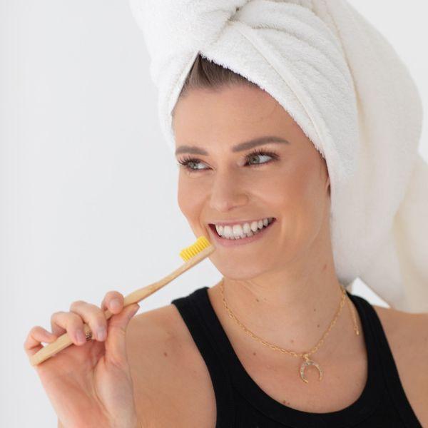 Bamkiki_Sustainable_Eco_Friendly_zero waste oral care bamboo toothbrush adult size limon yellow multipack free shipping woman brushing teeth