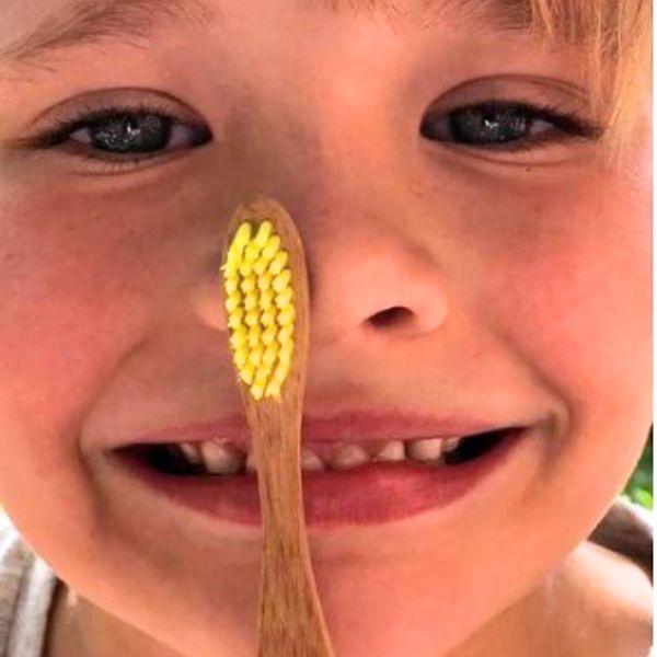Bamkiki_Sustainable_Eco_Friendly_zero waste oral care bamboo toothbrush toddler size little limon yellow multipack free shipping a child brushing teeth